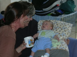 Aunt Lauren and Grandma talking to Xander Bear.